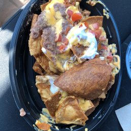 Burnt Nachos that are not even Taco Bell Nachos. They come from a crappy Mexican place down the street.