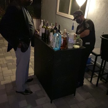 Professional Bartender - Eric making drinks.  We bought our alcohol and mixers but he can give you recommendations on what to buy and where to buy it. - Bartenders Near Me