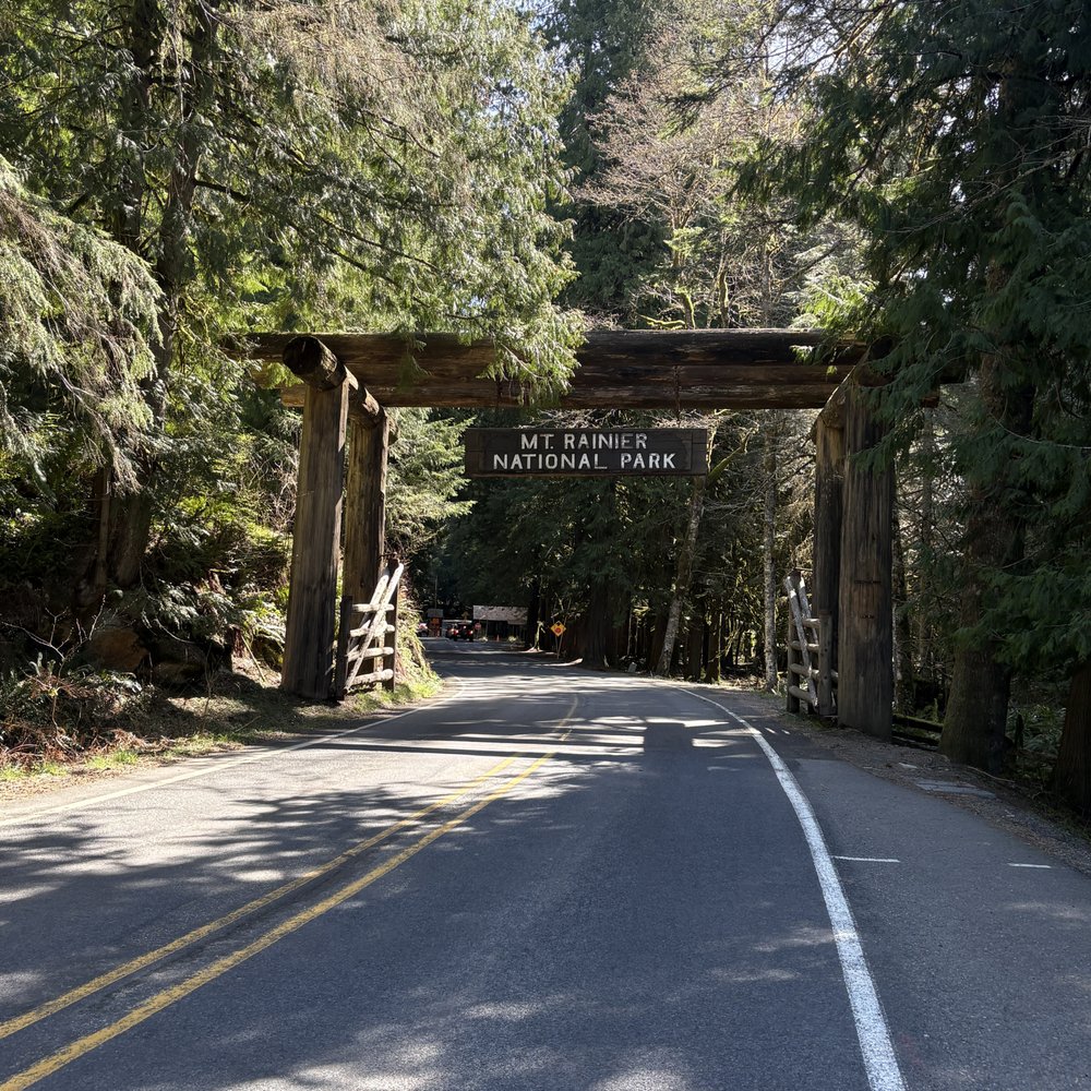 Customized Tours - Entrance sign of Mt Rainier National Park - Tours Near Me - Des Moines, Washington