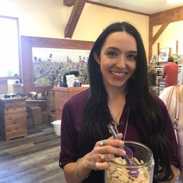 Lovely hostess giving out samples of lavender cookies