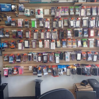 PC Cell Repair - Counter with cell phone cases. - Electronics Near Me - Providence, Rhode Island