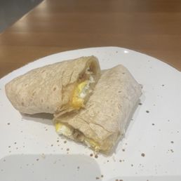 Breakfast wrap with egg, cheese and bacon.