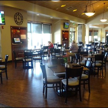 The Ridge Bar & Grill - The dining room is spacious, comfortable and offers a great view of the golf course. - Bars Near Me - Auburn, California