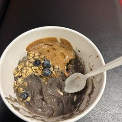 JuiceWell Memorial - Hedwig Village - Açaí bowl with blueberries, granola and almond butter. Mixed with with strawberry, banana and almond milk