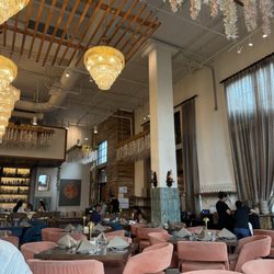 Yalda Persian & Middle Eastern Restaurant - Main dining room, tons of windows and low lighting for when it gets dark (I'm sure it's beautiful)