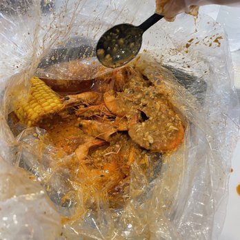 Cajun Bay Seafood & Bar - 1lb of shrimp/ corn/ potatoes - Seafood Near Me - Forney, Texas Cajun Bay Seafood & Bar - 1lb of shrimp/ corn/ potatoes - Seafood Near Me - Forney, Texas