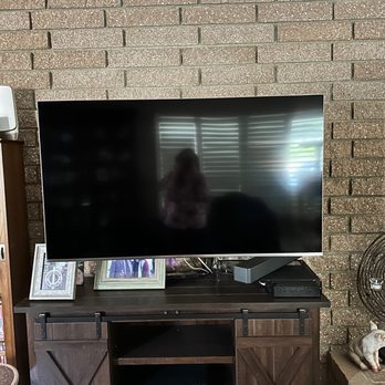High Definition Audio Video - mounted on brick wall - Home Theatre Installation Near Me