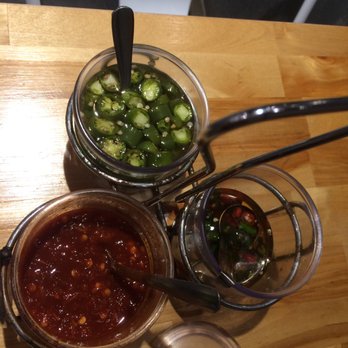 Saffron Thai - Spice rack on each table. Thai version of salsa bar! - Thai Near Me - San Diego, California Saffron Thai - Spice rack on each table. Thai version of salsa bar! - Thai Near Me - San Diego, California