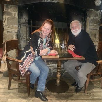 Gulliver's Restaurant - Our favorite table next to the fireplace. - American Near Me - Irvine, California
