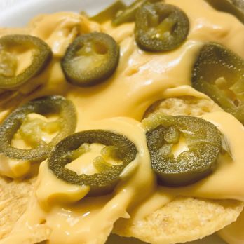 Amigos Snacks & More - Nachos and cheese w| jalapeños - Candy Stores Near Me - San Antonio, Texas Amigos Snacks & More - Nachos and cheese w| jalapeños - Candy Stores Near Me - San Antonio, Texas