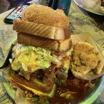 River City Cafe - The Kitchen Sink Burger. My brother in law got this one. He pretty much ate the entire thing. - American Near Me - Surfside Beach, South Carolina River City Cafe - The Kitchen Sink Burger. My brother in law got this one. He pretty much ate the entire thing. - American Near Me - Surfside Beach, South Carolina