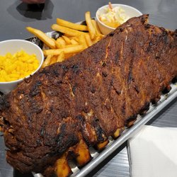 The Derby Room - Wednesday is (St. Louis) Pork rib night, 10 ribs $21.99. Unfortunately, dry, overdone, but good flavor. Sweet Baby Ray's bbq sauce.
