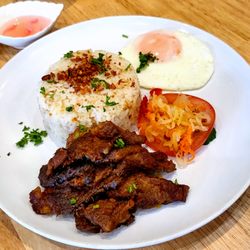 Tapsilog $19 (marinated beef with garlic rice, fried egg, atchara)