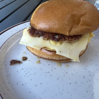 Hi Tulip Cafe - BYO Breakfast sandwich with scrambled eggs, Swiss cheese, sausage patty on brioche bun. - American Near Me - Flagler Beach, Florida Hi Tulip Cafe - BYO Breakfast sandwich with scrambled eggs, Swiss cheese, sausage patty on brioche bun. - American Near Me - Flagler Beach, Florida