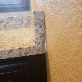 Springs Granite - Poor craftsmanship to include gaps, crooked stone, scratches and uneven polished surfaces. - Countertop Installation Near Me - Colorado Springs, Colorado Springs Granite - Poor craftsmanship to include gaps, crooked stone, scratches and uneven polished surfaces. - Countertop Installation Near Me - Colorado Springs, Colorado