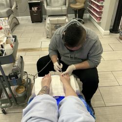 Queen Nail Salon - Working in the toes.