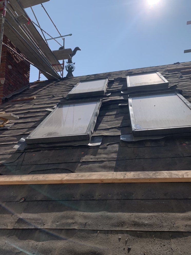 Slide of Juvens Roofing