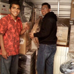 Hector (glasses) and Edwin, movers Hector (glasses) and Edwin, movers