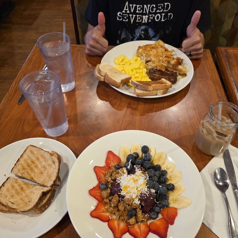 Broken Yolk Cafe - American Breakfast w/ bloody mary and an Acai Bowl w/ toast on the side, and an iced chai latte. - Breakfast & Brunch Near Me - Mesa, Arizona Broken Yolk Cafe - American Breakfast w/ bloody mary and an Acai Bowl w/ toast on the side, and an iced chai latte. - Breakfast & Brunch Near Me - Mesa, Arizona