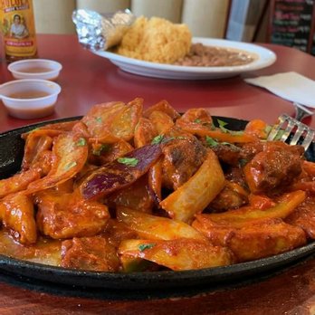 El Piketon Restaurant & Lounge - Chicken and Steak fajitas with a side of beans and rice. - Mexican Near Me - Kent, Washington El Piketon Restaurant & Lounge - Chicken and Steak fajitas with a side of beans and rice. - Mexican Near Me - Kent, Washington