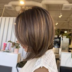 Salon Vitor - After photo of Aly successfully performing a great layered bob with new fresh highlights in honey blond .
