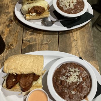 BeauxJax Crafthouse - Gator Andouille and pulled pork po'boys with red bean and rice cajun cups. - Bars Near Me - Bossier City, Louisiana BeauxJax Crafthouse - Gator Andouille and pulled pork po'boys with red bean and rice cajun cups. - Bars Near Me - Bossier City, Louisiana