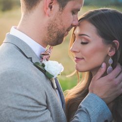 Wedding Videographers Utah Ryan Hender Films - Bride and groom in field after wedding ceremony