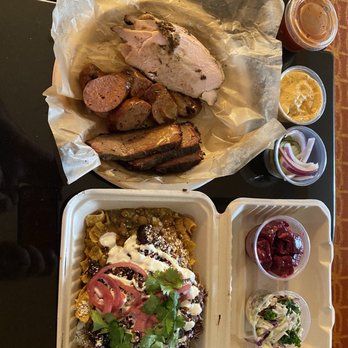 Micklethwait Craft Meats - Barbacoa frito pie, turkey, sausage and brisket.  Sides of Jalapeo Cheese Grits, Lemon Poppy Cole Slaw and beet salad - Food Trucks Near Me - Austin, Texas