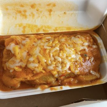 El Huero - Wet Carne Asado burrito with beans tomatoes, cheese, and onions. - Mexican Near Me - Los Angeles, California El Huero - Wet Carne Asado burrito with beans tomatoes, cheese, and onions. - Mexican Near Me - Los Angeles, California