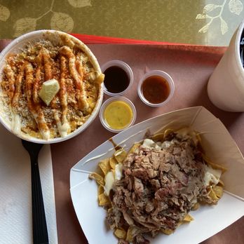 Chef J BBQ - Elotes (Mexican street corn). Frito pie with pulled pork and pinto beans. - Barbeque Near Me - Kansas City, Missouri