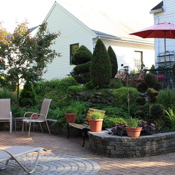 Brandt Landscape & Tree - a patio with chairs and umbrellas - Landscaping Near Me - Shillington, Pennsylvania Brandt Landscape & Tree - a patio with chairs and umbrellas - Landscaping Near Me - Shillington, Pennsylvania