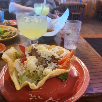 El Paseo Mexican Restaurant - Fort Worth - This is a picture of a very delicious taco salad with a margaritas. Mine is on the rocks, while the other margarita is frozen. - Mexican Near Me - Fort Worth, Texas