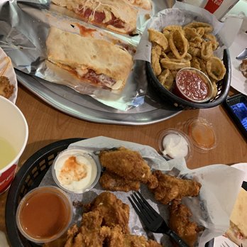 Tony's Pizzeria & Restaurant - Stromboli, calamari, wings after we already started on them - Pizza Near Me - Cape May, New Jersey Tony's Pizzeria & Restaurant - Stromboli, calamari, wings after we already started on them - Pizza Near Me - Cape May, New Jersey