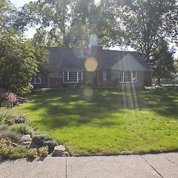 Rooted Landscape and Design - a house in a suburban neighborhood - Landscaping Near Me - Avon, Ohio Rooted Landscape and Design - a house in a suburban neighborhood - Landscaping Near Me - Avon, Ohio