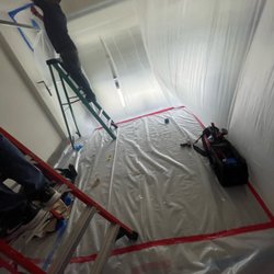 World Restoration - Containment and dust control.