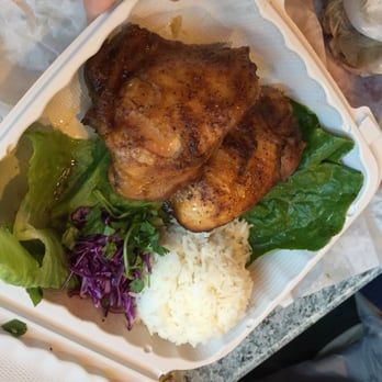 Paseo - Chicken thighs over rice - Caribbean Near Me - Seattle, Washington Paseo - Chicken thighs over rice - Caribbean Near Me - Seattle, Washington