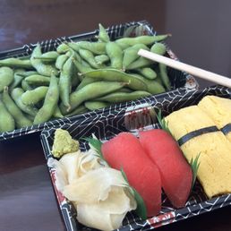 Tuna and sweet egg sushi, edamame. Tuna and sweet egg sushi, edamame.