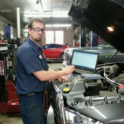TMA-Mitchell - Andy in the shop using a lab scope.