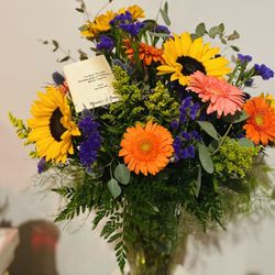 Wanda's and Durio's Flowers & Gifts - Sunflowers w/Gerbera Daisies & Purple Statice.