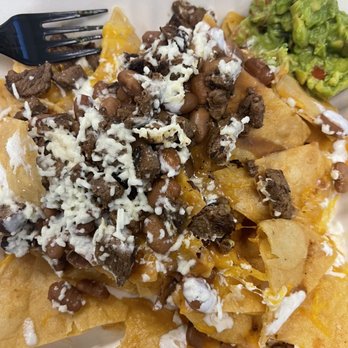 Spanglish Kitchen - Asada nachos - very little meat, even less cheese - Mexican Near Me - Alhambra, California Spanglish Kitchen - Asada nachos - very little meat, even less cheese - Mexican Near Me - Alhambra, California