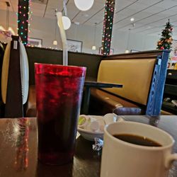 Saratoga Pizzeria & Grill - Inside dining, holiday lights