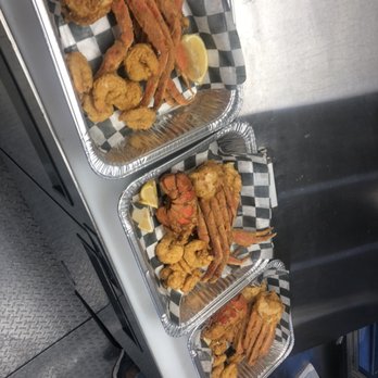 Six In A Ness - three trays of seafood - Food Trucks Near Me Six In A Ness - three trays of seafood - Food Trucks Near Me