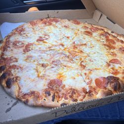 G’s NY Pizza - Large cheese pizza with pepperoni, garlic, and extra cheese.