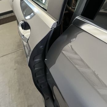 Bob's Auto Body Repair - Hit tile stacked in the garage while parking. No real damage, as far as dents or scratches, but the door "buckled" - Body Shops Near Me - Cathedral City, California