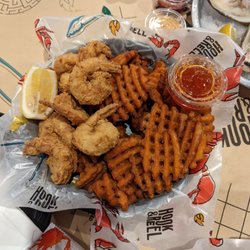 Hook & Reel Cajun Seafood & Bar - Shrimp basket with sweet potato fries.