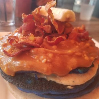 Bosscat Kitchen & Libations - The king: blue suede pancakes with peanut butter, bacon and banana - New American Near Me - Irvine, California Bosscat Kitchen & Libations - The king: blue suede pancakes with peanut butter, bacon and banana - New American Near Me - Irvine, California