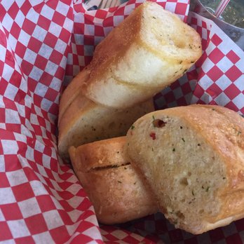 Tomato Street - The buttery garlic bread. - Italian Near Me - Spokane, Washington Tomato Street - The buttery garlic bread. - Italian Near Me - Spokane, Washington