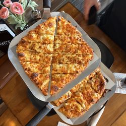Crust Pizzeria - General's Cheesy Bread (top rack) and Hawaiian Paradise (bottom rack)