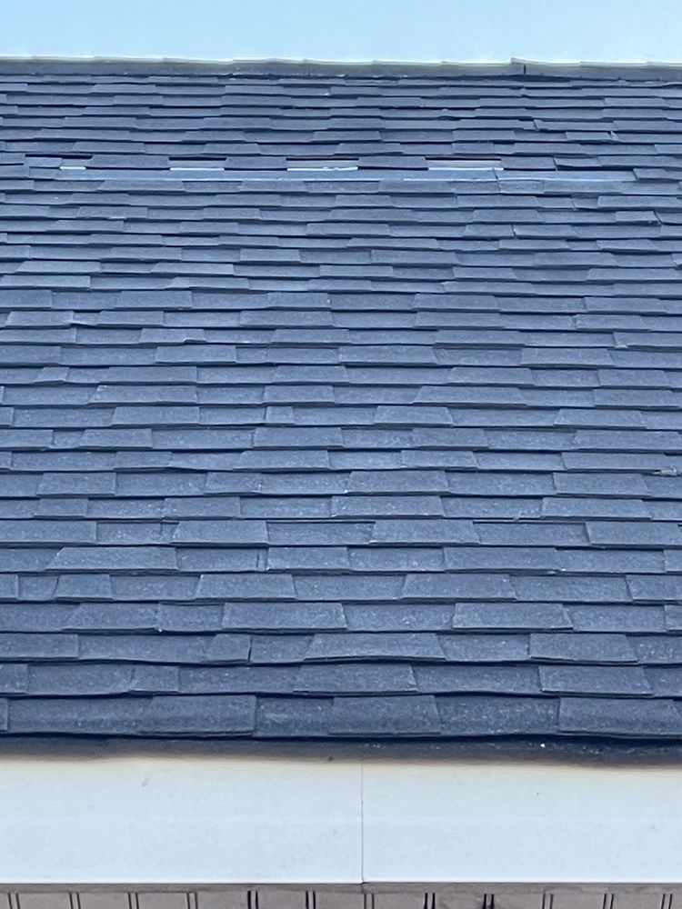 Slide of Atlas Roofing and Construction