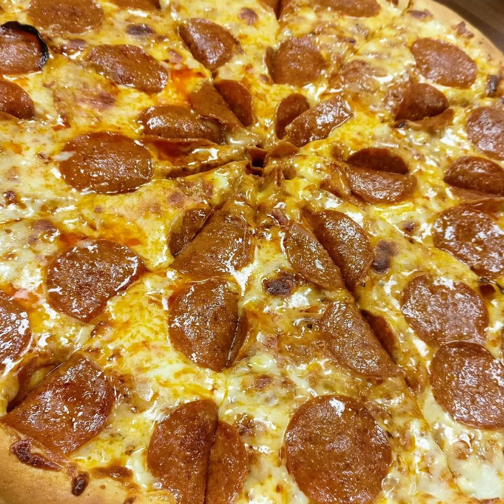 Hide 'n' Seek - The large pepperoni pizza. It was merely ok. - Kids Activities Near Me - Calgary, Alberta